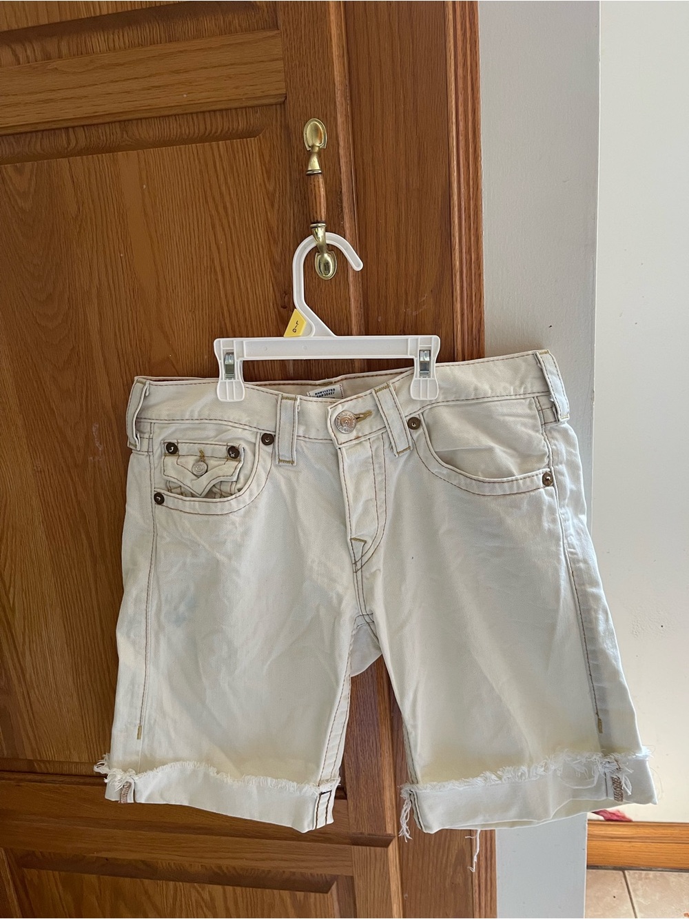 True Religion Cream Denim Shorts with Red Logo Patch